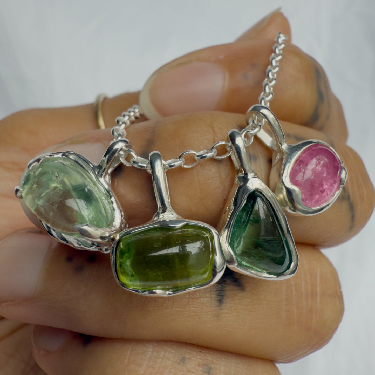 sterling silver pendants with tourmaline stones