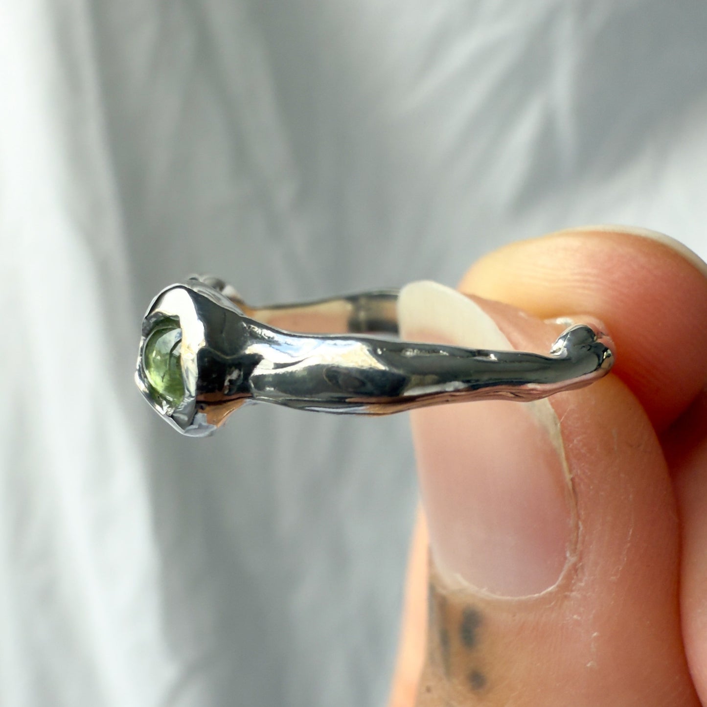 pink and green tourmaline ring that was carved from wax and cast in sterling silver